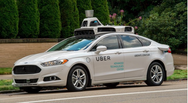 Uber Self-driving Car, White Ford Parked On A Street